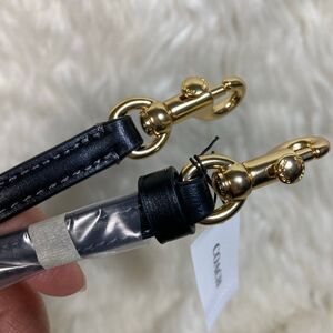 Coach Black and Gold crossbody leather strap